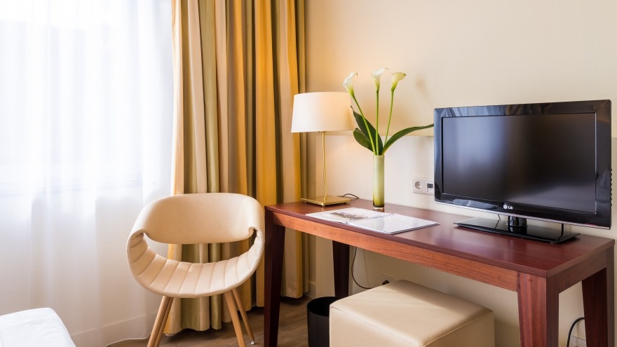 new leather-clad armchair in a standard room