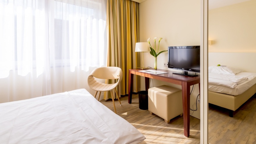 standard single room covered with vinyl floor